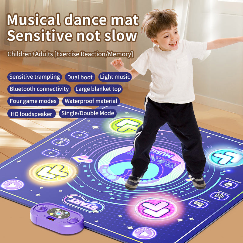 Boy jumping on a dark blue light up dance mat toy with sensitive step pads, Bluetooth connection and waterproof surface