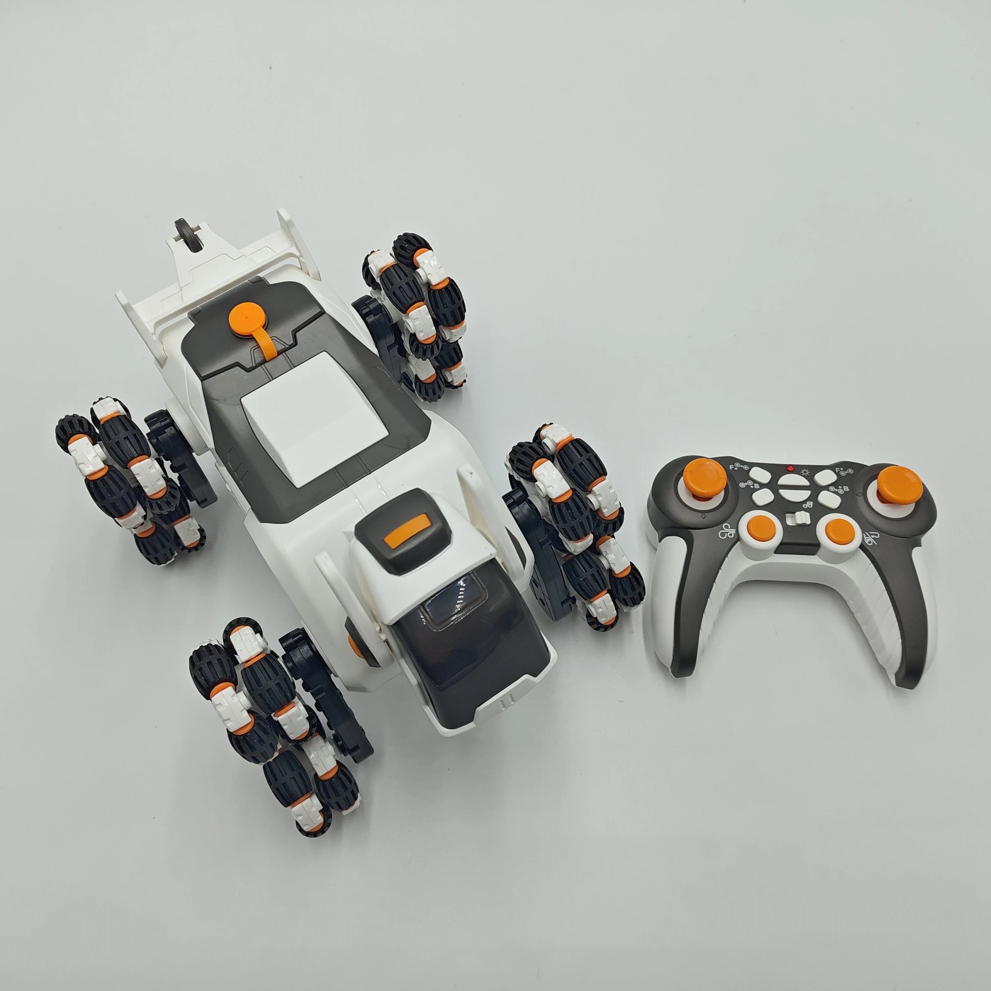 This electric remote-controlled smart robot dog kit includes a spray function, remote control, and accessories, perfect for children's exploration and entertainment.